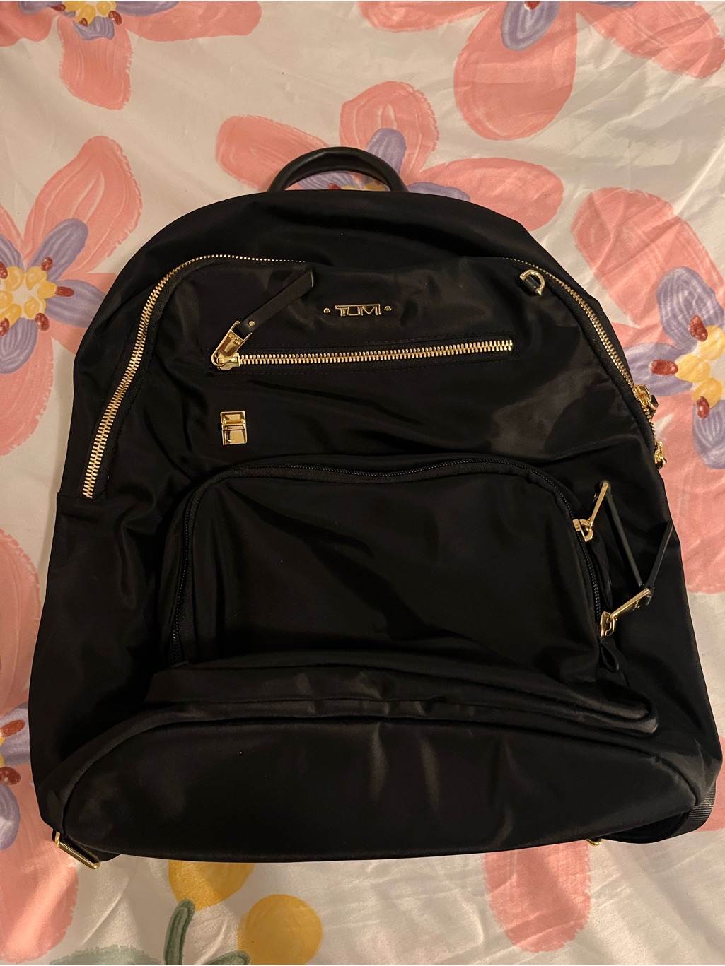 Tumi Black Nylon Backpack With Gold Hardware Accents